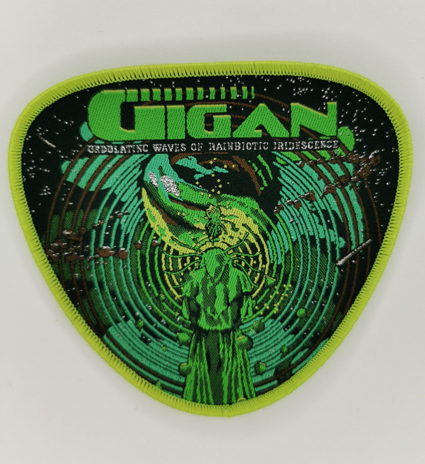 Gigan Undulating Waves of Rainbiotic Iridescence Light Green Border Woven Patch Progressive/Technical Death Metal