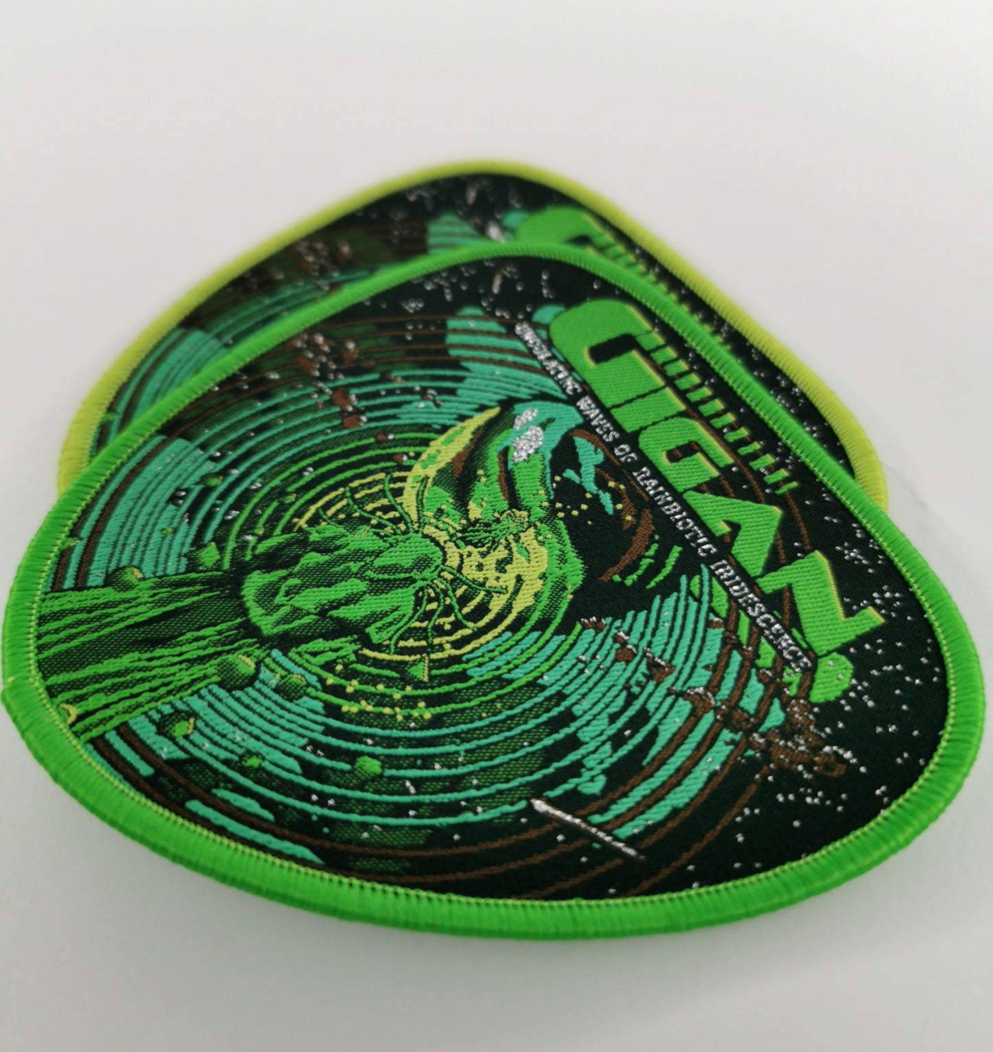 Gigan Undulating Waves of Rainbiotic Iridescence Light Green and Dark Green Border Woven Metal Patches Progressive/Technical Death Metal