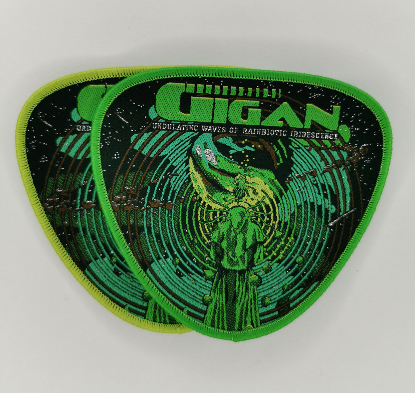 Gigan Undulating Waves of Rainbiotic Iridescence Light Green and Dark Green Border Woven Patches Progressive/Technical Death Metal