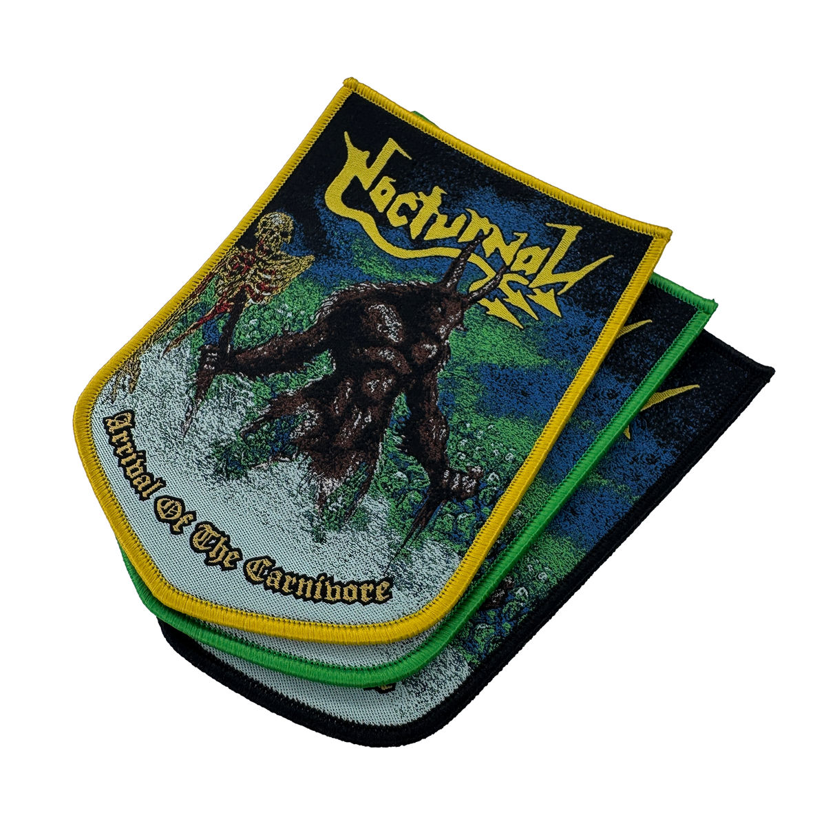 A stack of three metal band patches for the band 'Nocturnal', featuring the album artwork 'Arrival of the Carnivore'. The top patch is displayed flat, showing a skeleton and a dark creature on a green and blue background with yellow borders.